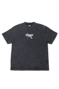 Vintage washed black streetwear t-shirt with minimal chest graphic and subtle logo detail on a clean studio background.